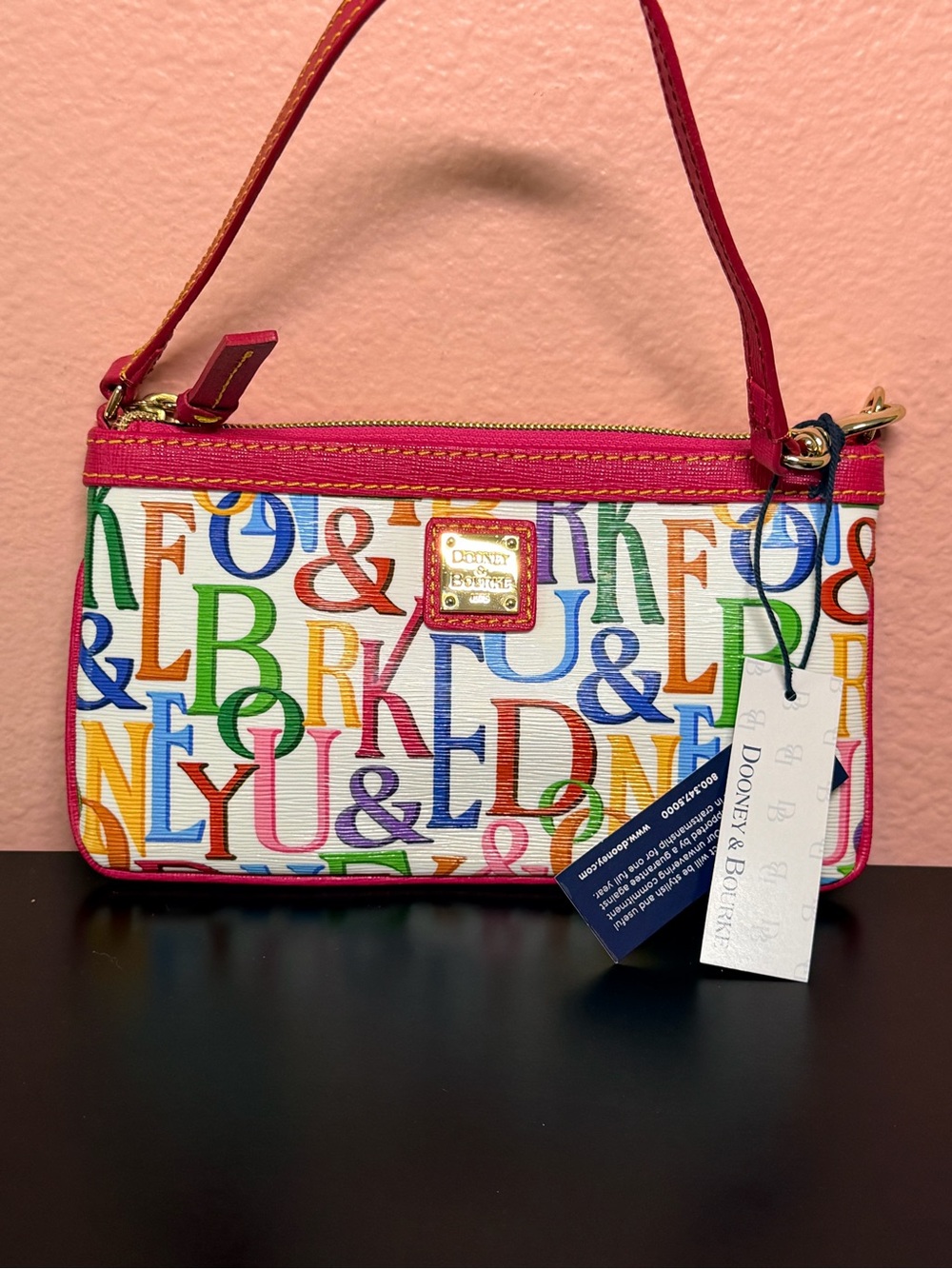 NWT Dooney & Bourke Multicolor Logo Print Wristlet with Pink Trim